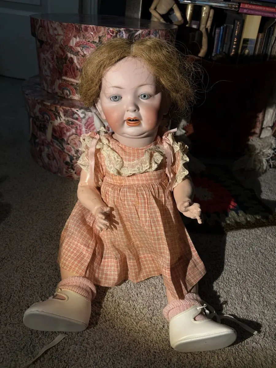 Hertel Schwab 152 doll wearing a peach dress, full view.