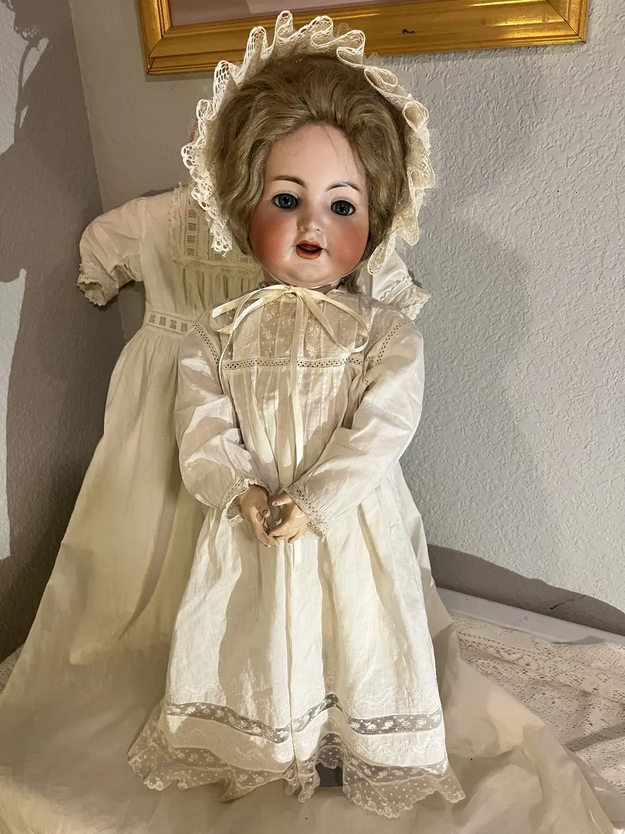 Simon and Halbig K*R 126 Toddler doll wearing a white dress, full view.